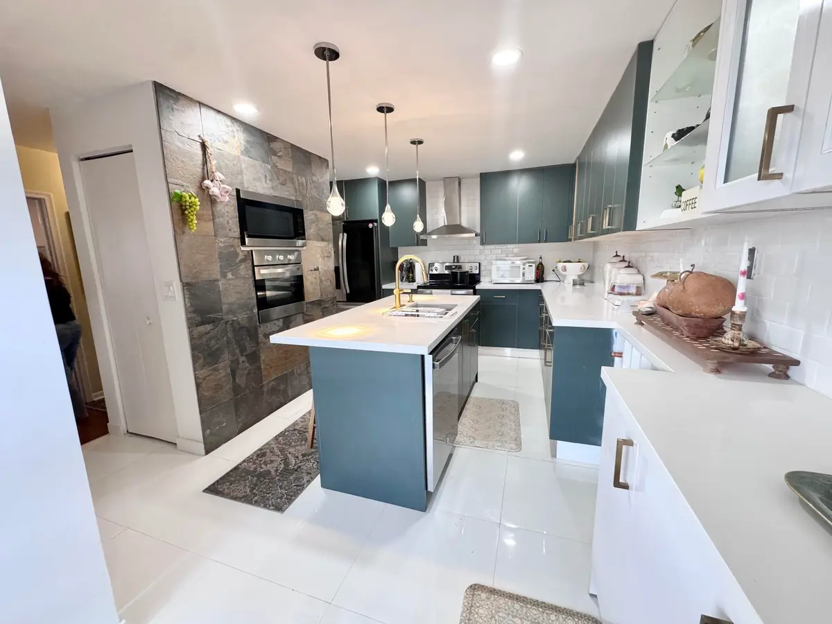 Slate wall, built-in microwave and oven at 1341 NW 20TH Avenue 203, Delray Beach