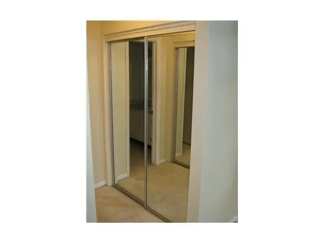 2 CLOSETS MIRRORED DOORS MAIN BDRM at 733 SE 1ST Street 310, Deerfield Beach