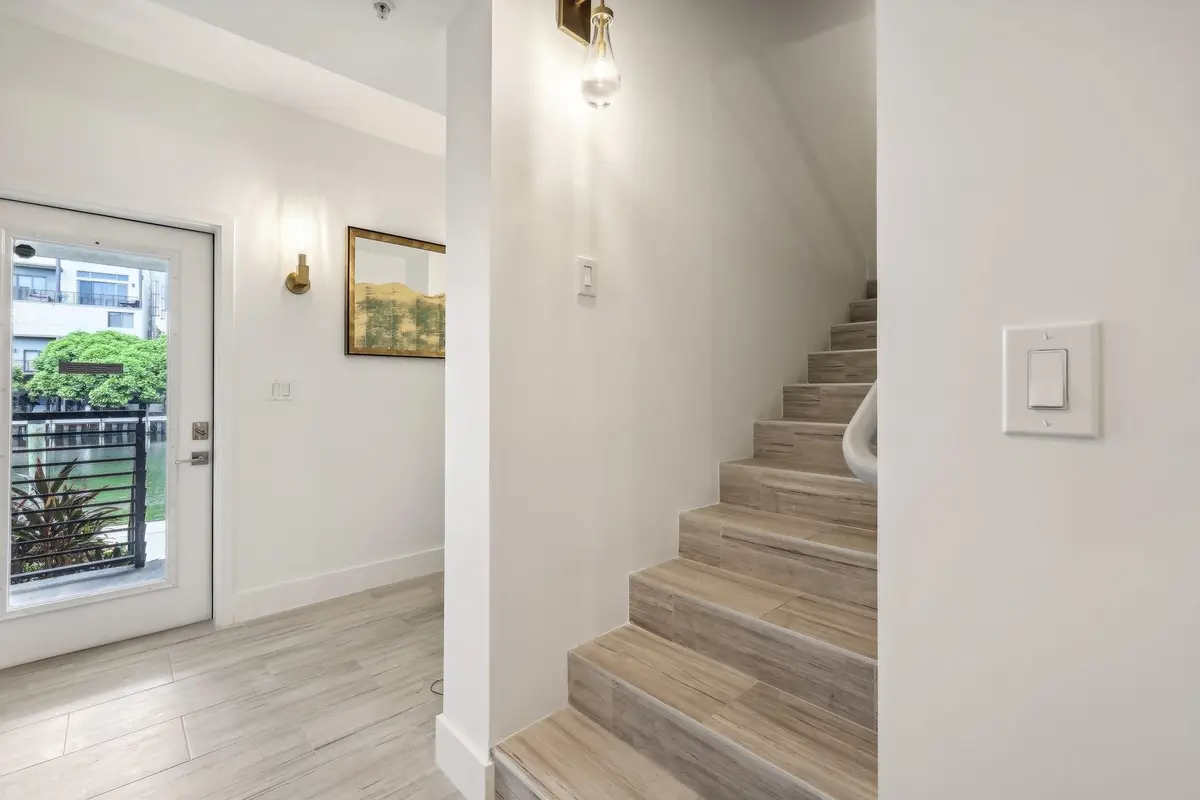 Stairs leading to the 2nd floor at 161 SE 1ST Circle 161, Pompano Beach