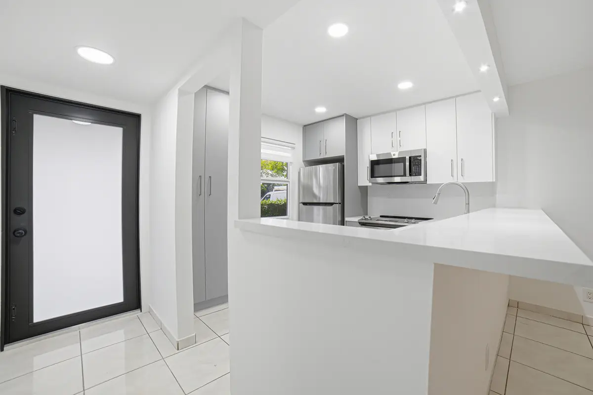 07-Entrance-Kitchen at 3121 NW 47TH Avenue 109, Lauderdale Lakes