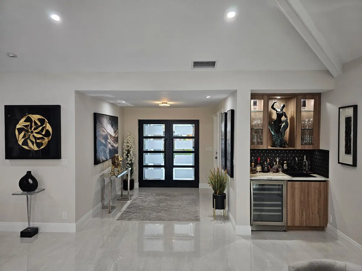 Foyer & Wet Bar at 612 PINE LAKE Drive, Delray Beach