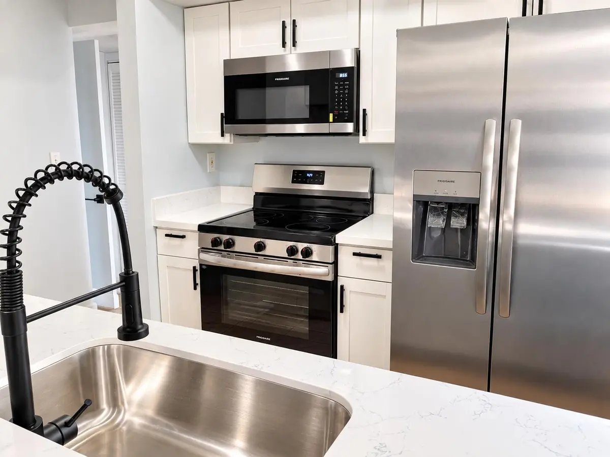 Modern Kitchen with Stainless Appliances at 18286 MEDITERRANEAN Boulevard 202, Hialeah