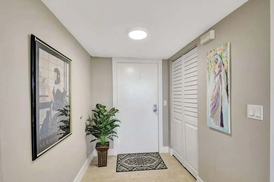 Front door at 3590 S OCEAN Boulevard 104, South Palm Beach