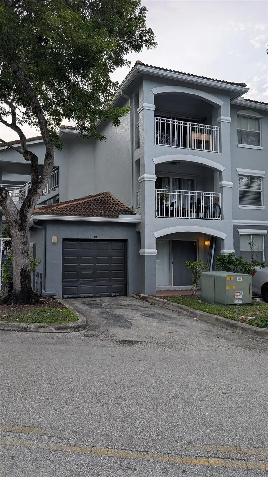 Front of building and unit's garage 9-1 at 150 NW 96TH Avenue 9-101, Pembroke Pines