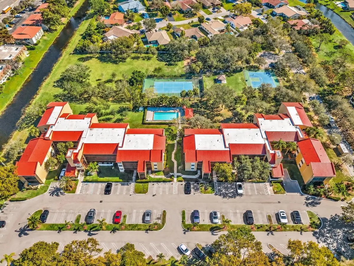 Aerial View of a Tropical Condo Communit at 2073 CORAL RIDGE Drive N205, Coral Springs