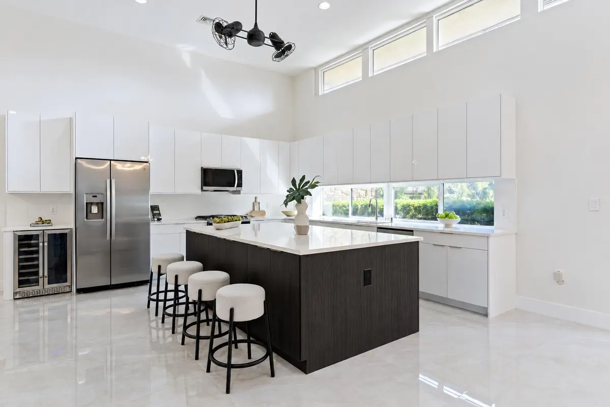 Modern White Kitchen with Dark Wood Isla at 2701 NE 2ND Avenue, Wilton Manors