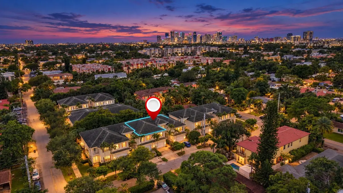 Blue-hour townhouse with cyan outline at 1752 NE 12TH Street, Fort Lauderdale