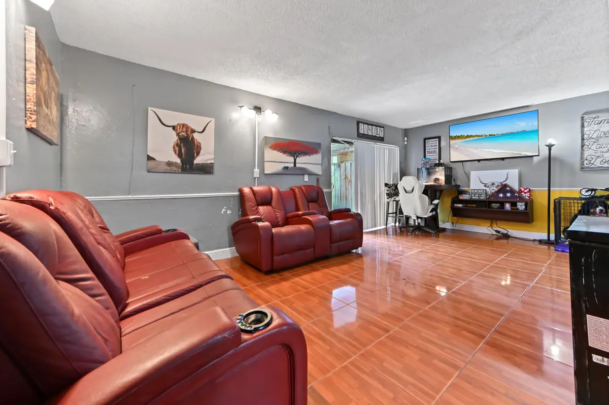 06 living room 01 at 941 W 80th Place, Hialeah