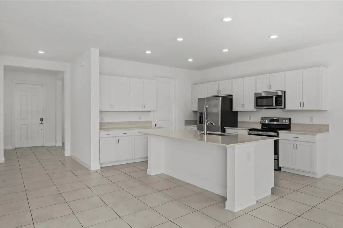 Kitchen And Foyer at 13248 NW Copper Creek Drive, Port St. Lucie