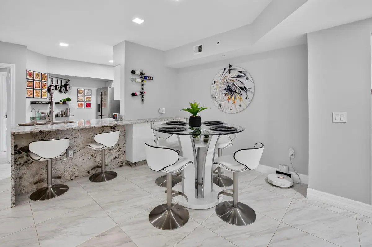 Dining Area & Breakfast Bar at 2109 TUSCANY Way 109, Boynton Beach