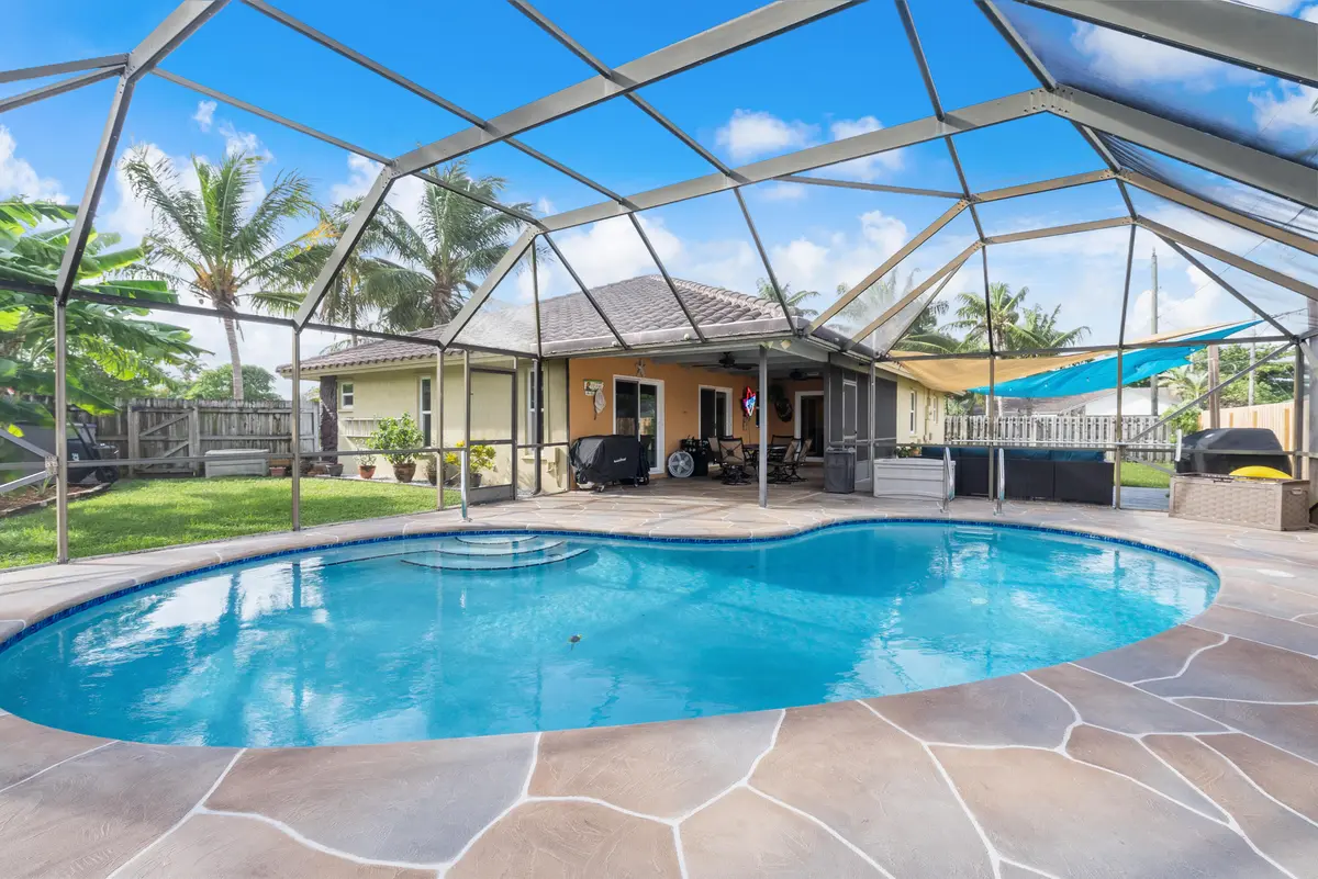 screened in pool at 1119 SEA PINES Way, Lantana