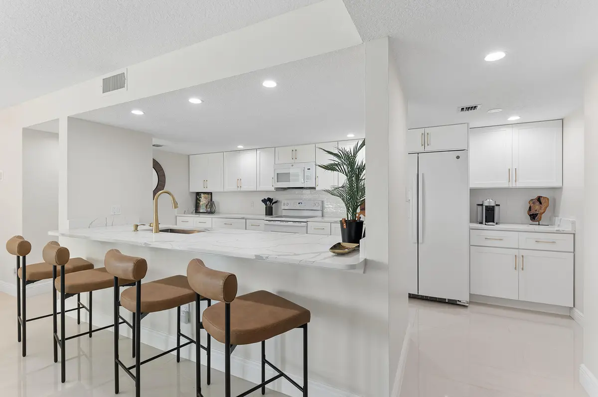 Kitchen open concept at 2025 LAVERS Circle D404, Delray Beach