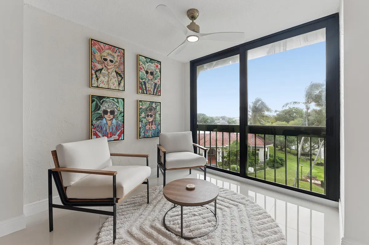 Patio converted to living space at 2025 LAVERS Circle D404, Delray Beach