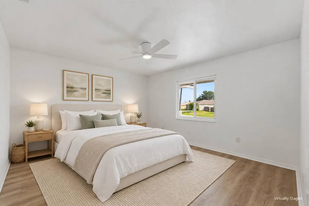 Coastal modern staged bedroom-3 at 2674 SW Monterrey Lane, Port St. Lucie