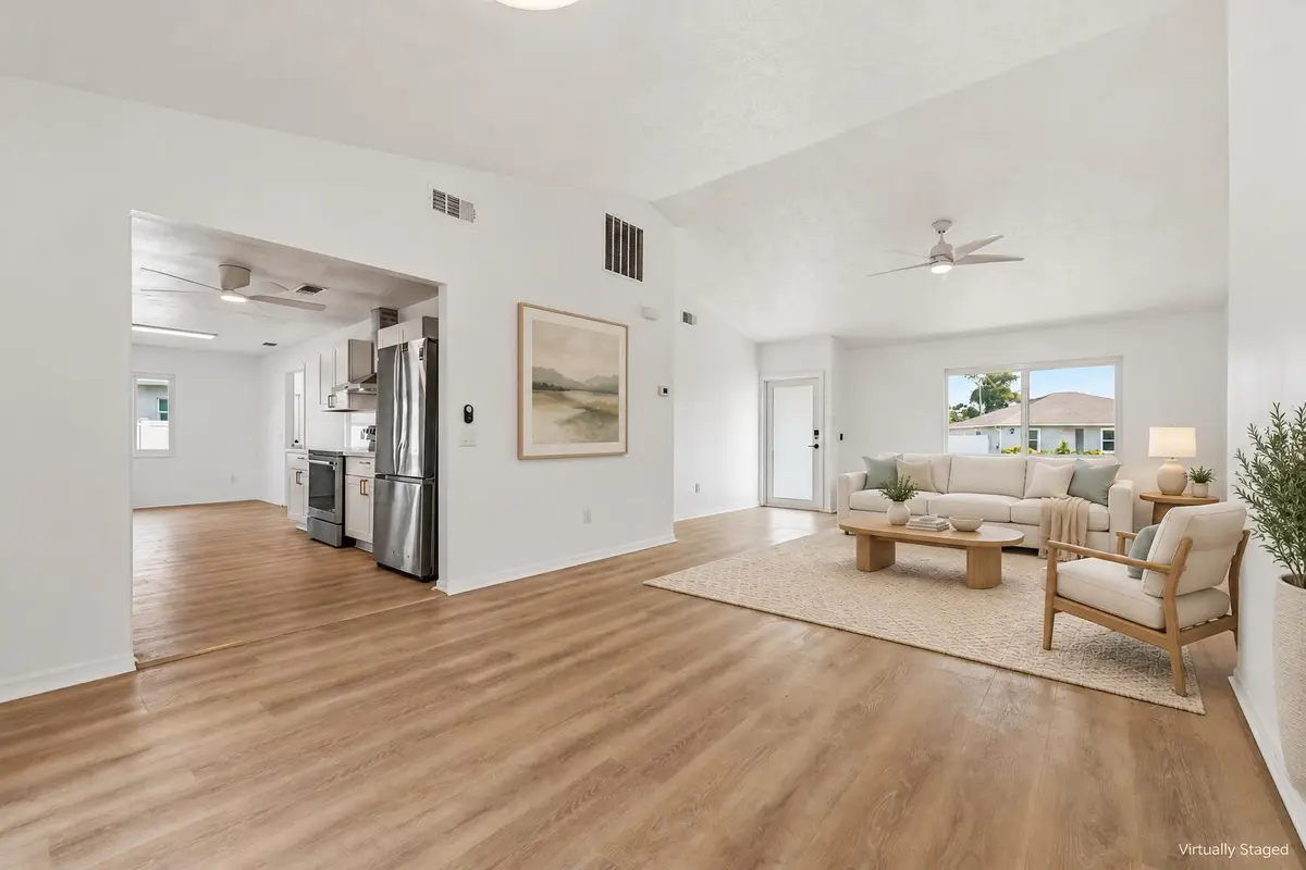 Coastal-modern front living room staging at 2674 SW Monterrey Lane, Port St. Lucie