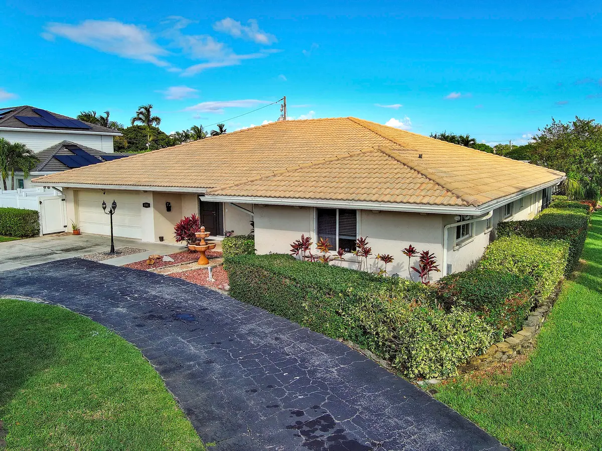 Exterior Front Aerial at 2700 NE 4TH Way, Boca Raton