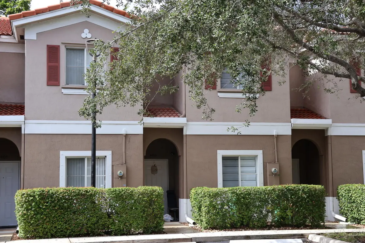 front 1 at 4410 WOODLAND Circle, Tamarac