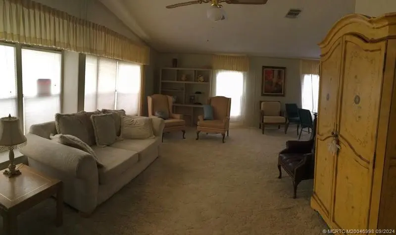 living room at 14642 SW Divot Drive D-06, Indiantown