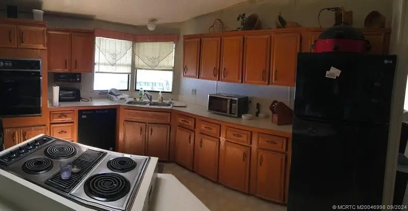 Photo 5 at 14642 SW Divot Drive D-06, Indiantown