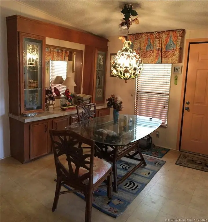 Dinning room at 16222 SW Five Wood Way, Indiantown