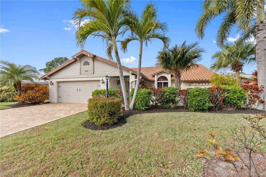 Concrete block with paved driveway at 1828 SE Coronado Lane, Stuart