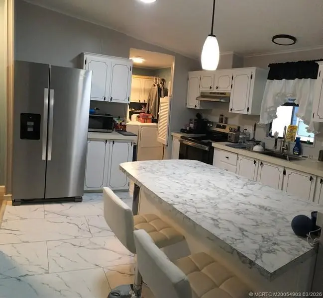 KITCHEN at 15988 SW Indianwood Circle F-39, Indiantown