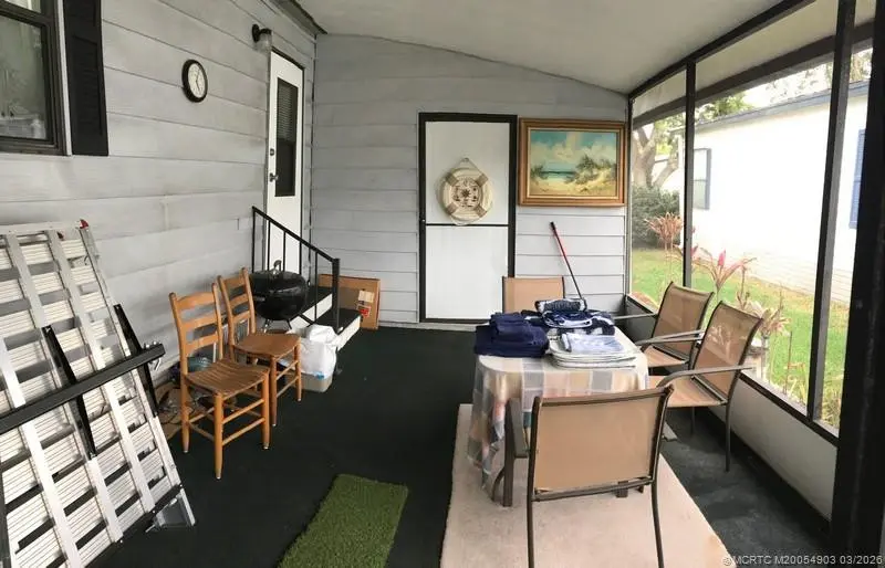 SCREEN PORCH at 15988 SW Indianwood Circle F-39, Indiantown