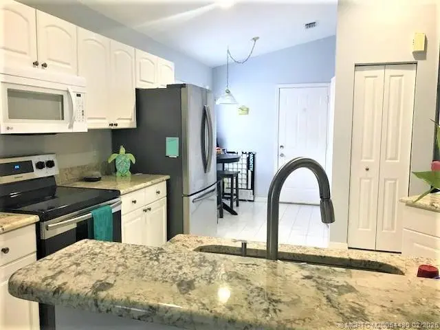 Photo 6 at 3486 SW Pindo Palm Lane, Palm City