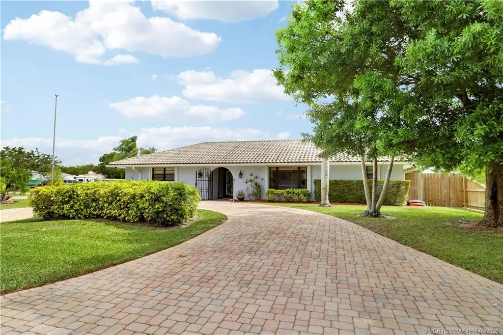 Photo 1 at 4379 SE Tall Pines Avenue, Stuart