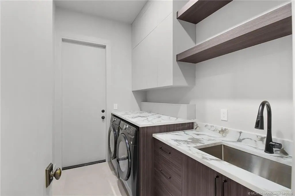 Laundry Room at 207 SE Via Bisento, Port St. Lucie