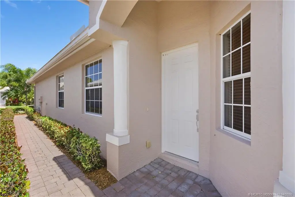 Private Front Door Entrance at 830 NW Red Pine Way, Jensen Beach