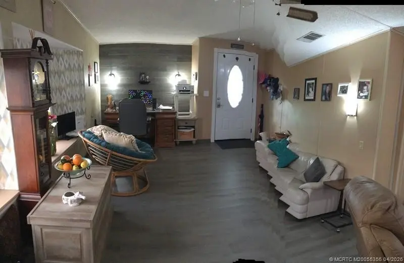 Living Room at 14391 SW Divot Drive A-40, Indiantown