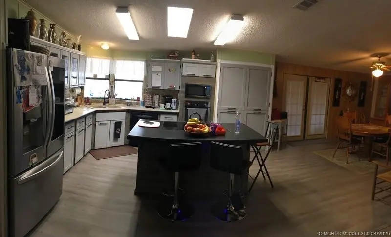 Kitchen at 14391 SW Divot Drive A-40, Indiantown