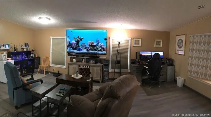 Living Room at 14391 SW Divot Drive A-40, Indiantown