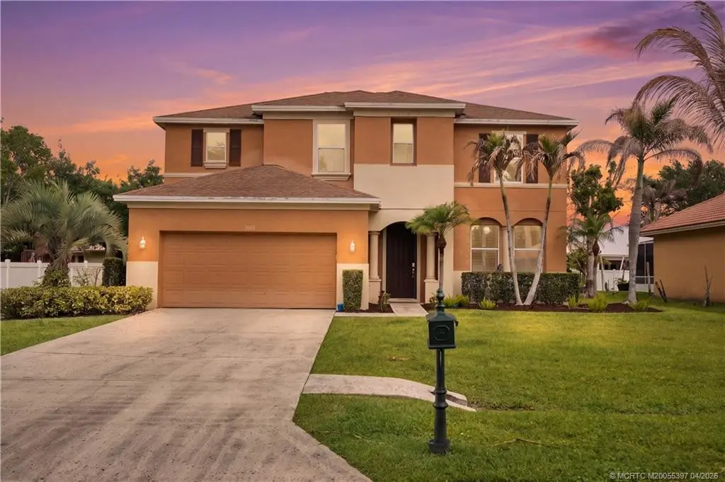 Front (night) at 5805 NW Breezy Brook Court, Port St. Lucie
