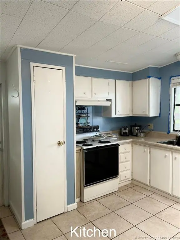 Kitchen at 16234 Four Wood Way L-02, Indiantown