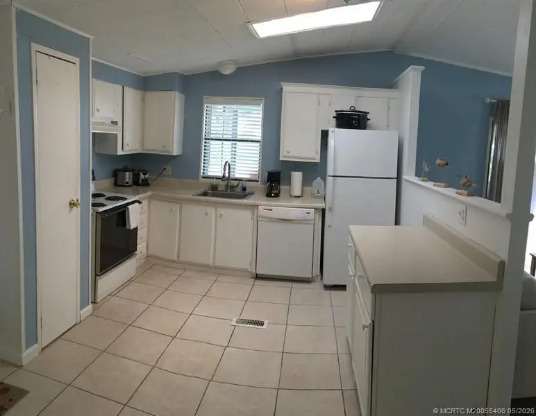 Kitchen at 16234 Four Wood Way L-02, Indiantown