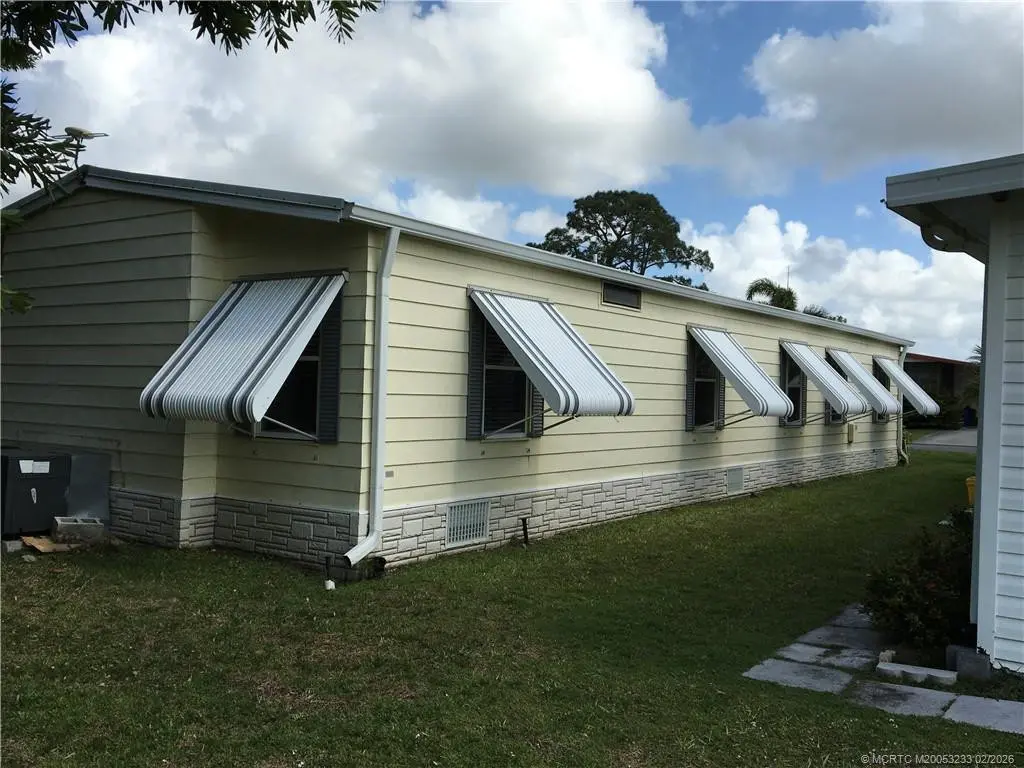 side view at 16286 Three Wood Way M-07, Indiantown