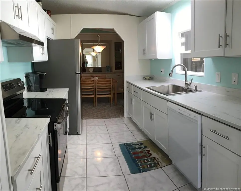 Kitchen at 16286 Three Wood Way M-07, Indiantown
