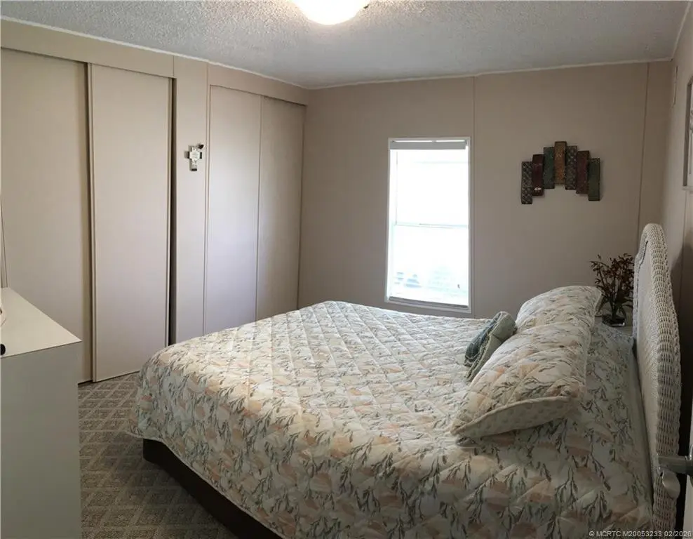 Guest Bed room at 16286 Three Wood Way M-07, Indiantown