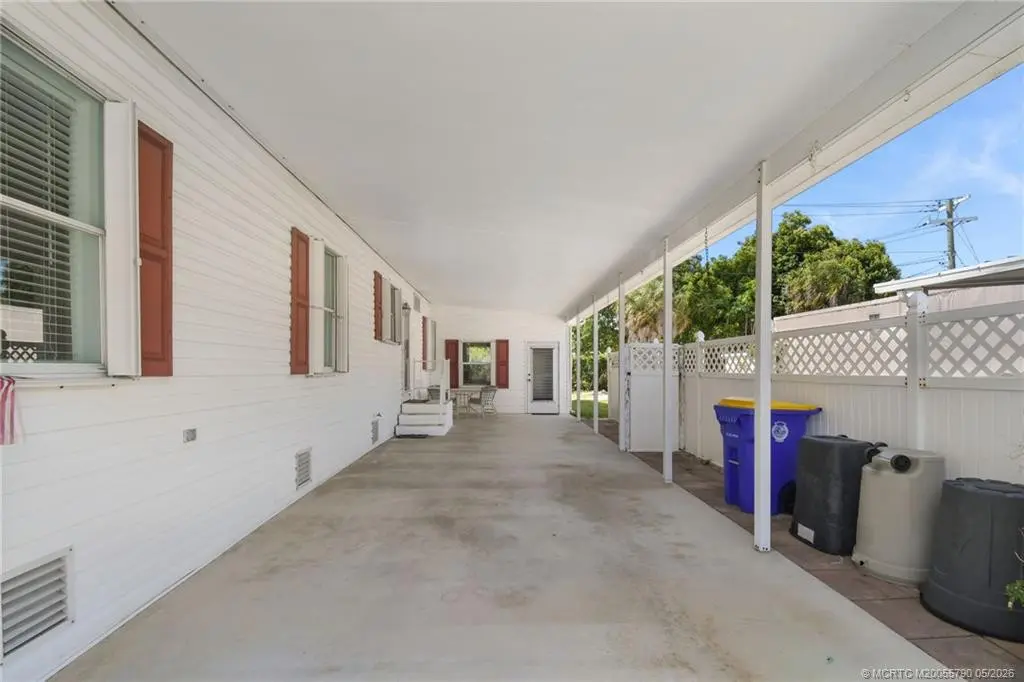 Carport with lots of room at 7149 SE Ridgeway Terrace, Hobe Sound
