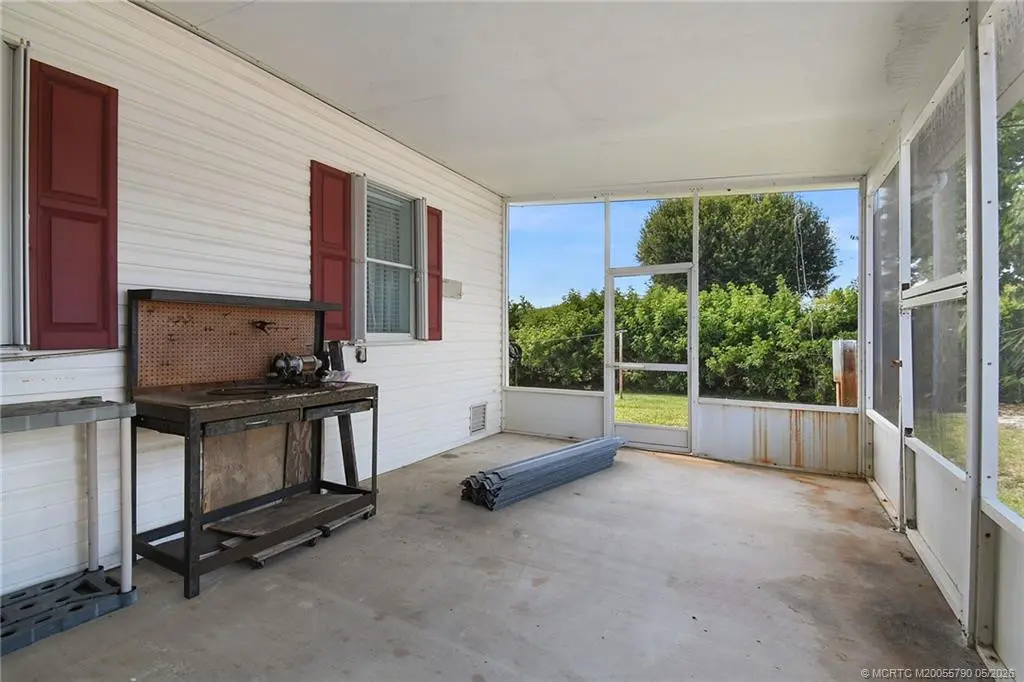Spacious screened patio at 7149 SE Ridgeway Terrace, Hobe Sound