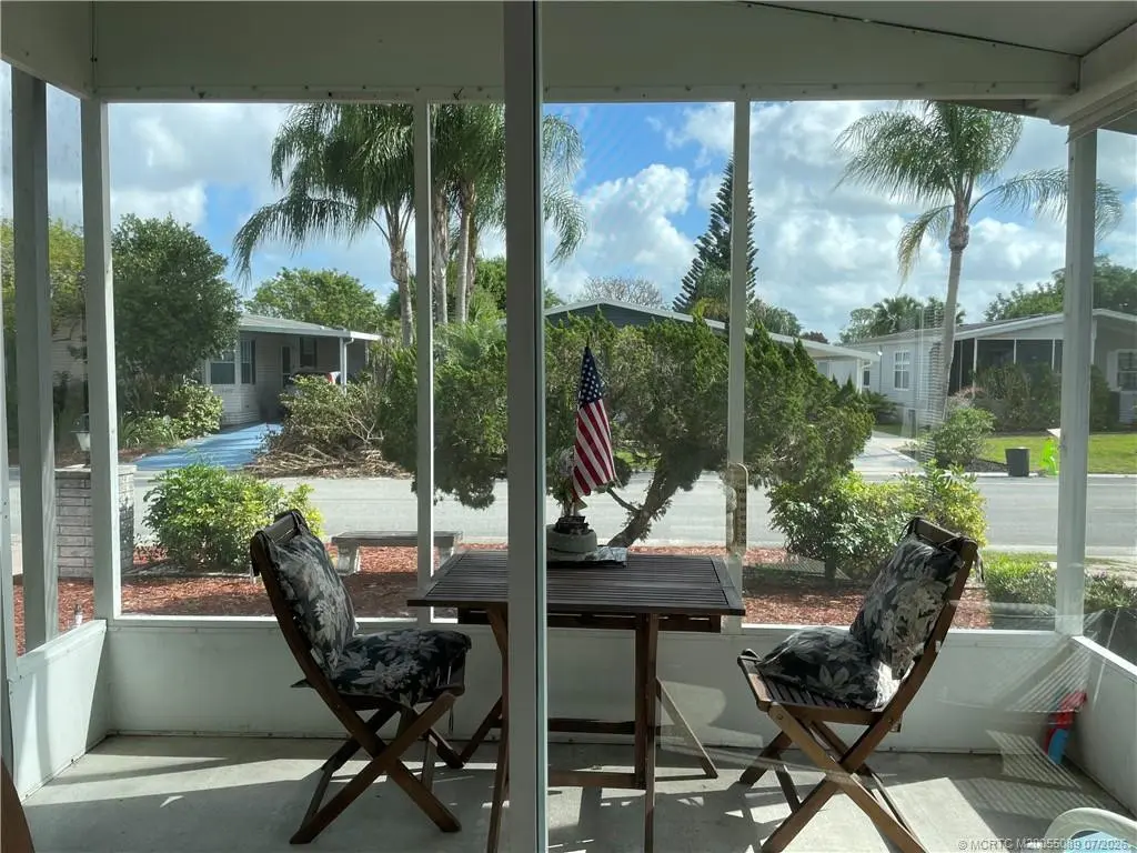 Screened lanai for outdoor relaxation. at 16300 SW Indianwood Circle, Indiantown