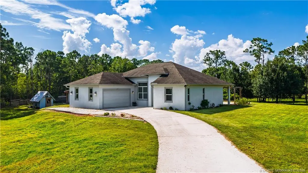 Photo 1 at 6347 SW Travers Street, Palm City