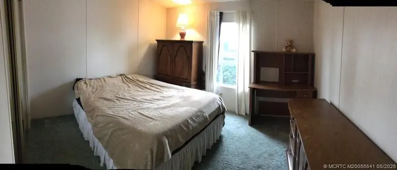 Guest bed room at 16105 SW Indianwood Circle J-30, Indiantown