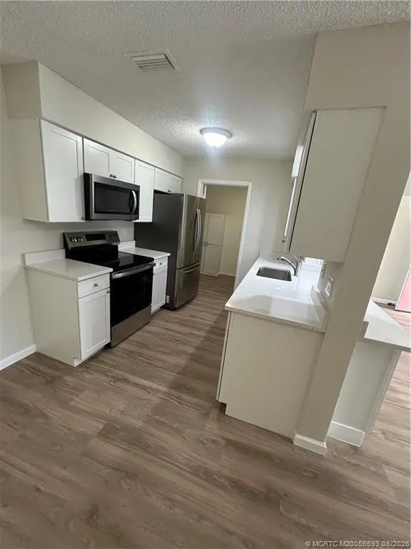 Photo 2 at 4015 NW Cinnamon Tree Circle, Jensen Beach