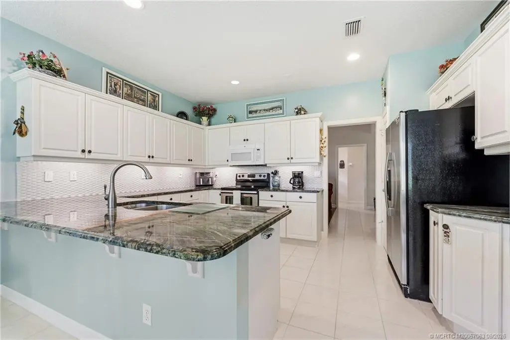 Photo 7 at 3663 SE Cambridge Drive, Stuart