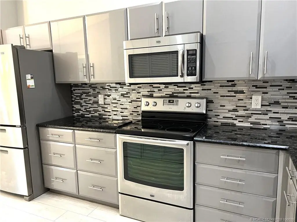 Kitchen 11' x 20' at 3678 SW Whispering Sound Drive, Palm City