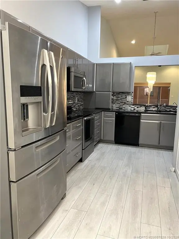 All Stainless Steel Appliances at 3678 SW Whispering Sound Drive, Palm City