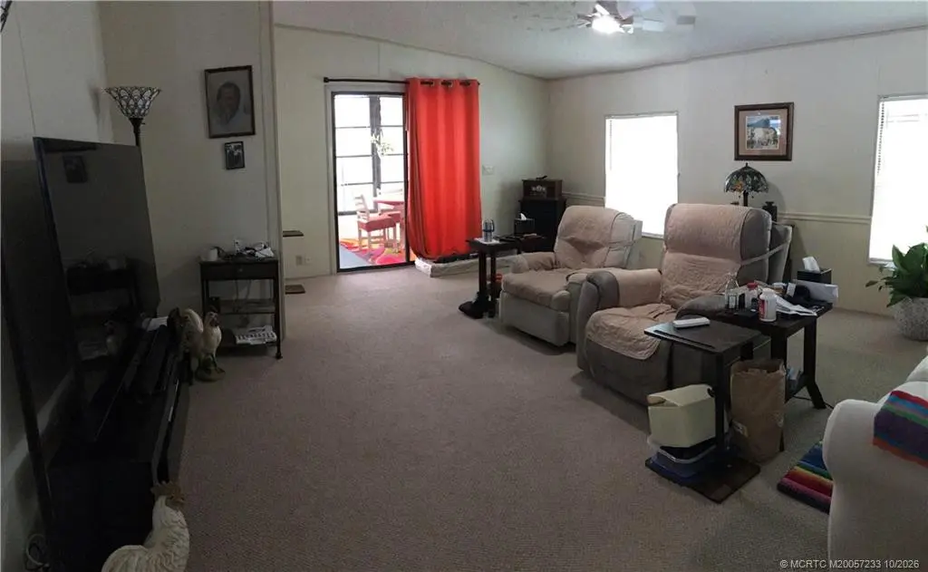 Living room at 16328 SW Indianwood Circle B-18, Indiantown